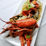 オマール海老の丸ごとロースト海老味噌オイルソース